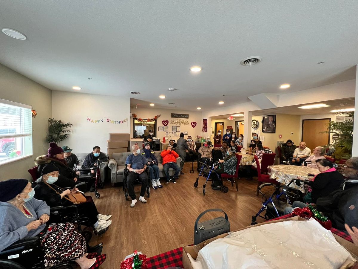 Residents at Empower Center Care gathered in community space