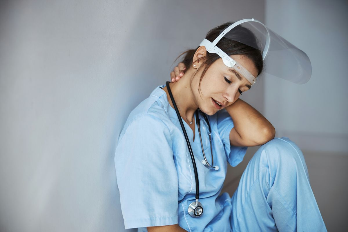 Nurse exhausted from work